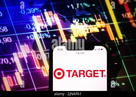 KONSKIE, POLAND - August 09, 2022: Smartphone displaying logo of Target company on stock exchange diagram background Stock Photo