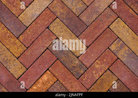 chevron or herringbone tile floor pavement real life texture and background Stock Photo