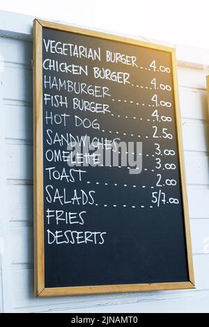 Close up of a blackboard menu outside a cafe in Corralejo Fuerteventura Stock Photo