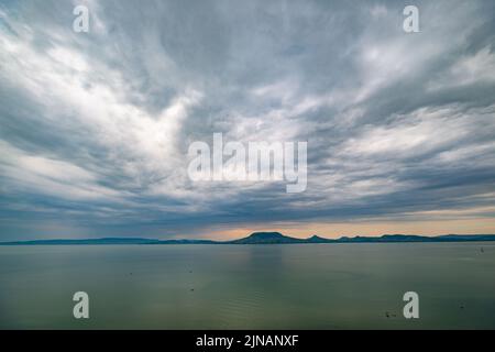 Ominous sky when storm clouds gather over Lake Balaton in Hungary Stock Photo