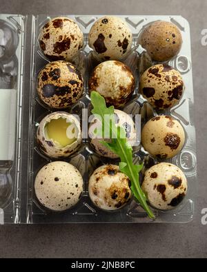 Quail eggs in a box Stock Photo