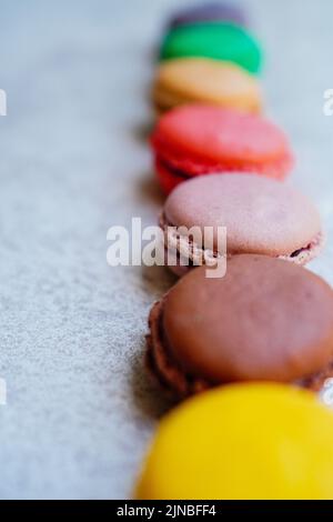 Vertically arranged colorful macaroons Stock Photo