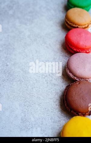Vertically arranged colorful macaroons Stock Photo