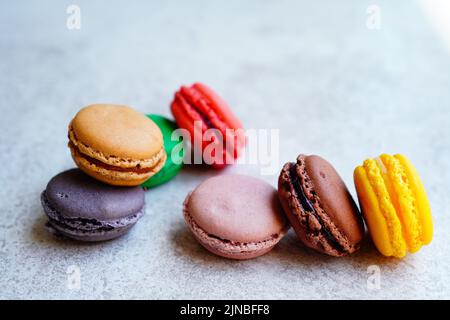 Macaroons on white marble table Stock Photo
