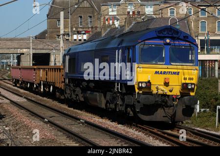 DB Cargo class 66, 66090 Maritime Intermodal Six, Maritime Blue livery, diesel-electric loco at Carnforth on West Coast Main Line10th August 2022. Stock Photo