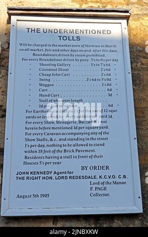 Toll Charges on stone curfew tower, tollboth ,High street, Moreton-in-marsh, Evenlode Valley, Cotswolds, Oxfordshire, England, UK, GL56 0AF Stock Photo