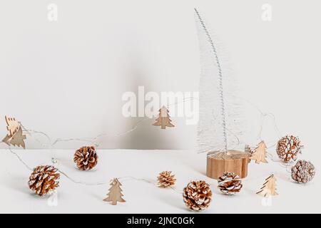 Minimalistic eco friendly scandinavian christmas background in white colors. Place for text Stock Photo