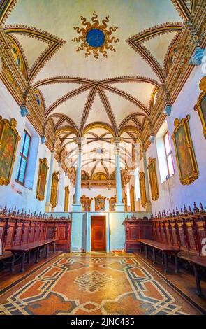 CERTOSA DI PAVIA, ITALY - APRIL 9, 2022: The main hall of Refectory of Certosa di Pavia monastery, on April 9 in Certosa di Pavia, Italy Stock Photo