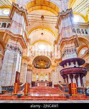 PAVIA, ITALY - APRIL 9, 2022: The main Altar of Duomo di Pavia, on April 9 in Pavia, Italy Stock Photo