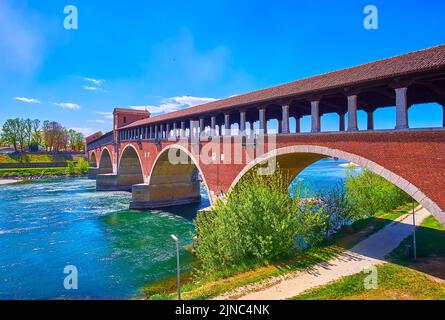 Ponte Coperto brick bridge over Ticino River in Pavia, Italy Stock Photo