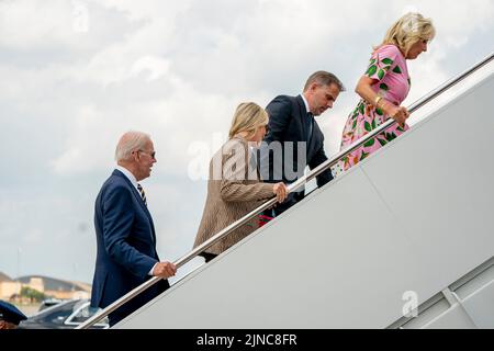 United States President Joe Biden boards Air Force One with his son Hunter Biden (2-R), Melissa Cohen (2-L) and First Lady Jill Biden at Joint Base Andrews, Maryland, USA, 10 August 2022.Credit: Shawn Thew/Pool via CNP /MediaPunch Stock Photo