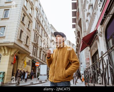 man enjoy coffee while relaxing in city street in turkey Stock Photo