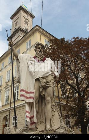 Statue of Neptun in front of the town hall of Lviv, dressed up in vyshyvanka for independence day, 2010, Ukraine Stock Photo