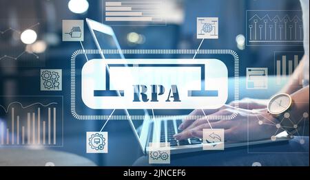 Woman working on laptop in office. RPA concept Stock Photo