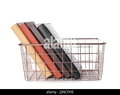 Pink metal basket with books on white background Stock Photo