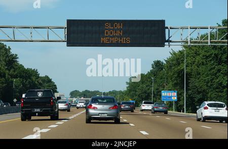 Memphis, Tennessee, U.S.A - June 23, 2022 - The highway LED sign warning the drivers to slow down on the highway Stock Photo