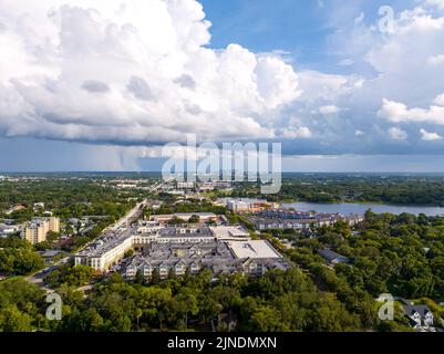 Aerial view of Maitland Florida with downtown Orlando in the distance with rain showers. June 27, 2022 Stock Photo