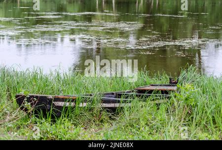 Wooden boats pulled to the shore of the National Park - Sodros. Stock Photo