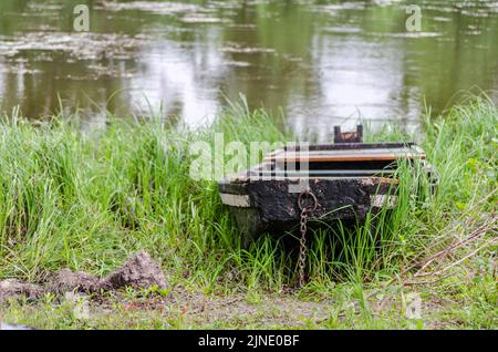 Wooden boats pulled to the shore of the National Park - Sodros. Stock Photo