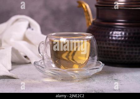 Linden tea. Linden tea on stone background. Herbal tea concept. Healthy drinks. close up Stock Photo