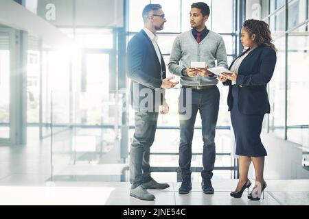 Teamwork, development and working together group of businesspeople, team or colleagues sharing ideas. Diverse coworkers talking, planning and Stock Photo