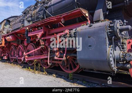 Editorial: BOCHUM, NORTH RHINE-WESTPHALIA, GERMANY, JUNE 12, 2022 - Detail of a steam locomotive on display in the railway museum of Bochum Stock Photo