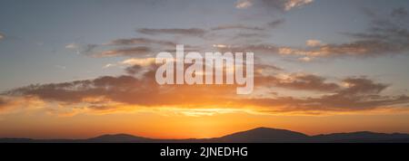 Panorama of a dramatic evening sky Stock Photo