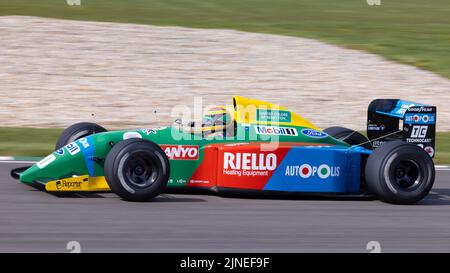 1990 Benetton-Ford B190  F1 racer demonstration run with driver John Reaks at the 79th Goodwood Members Meeting, Sussex, UK. Stock Photo