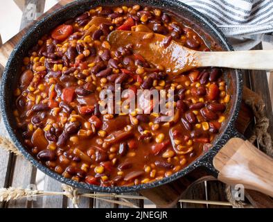 Vegan bean stew - Chili sin carne - fresh and homemade cooked in skillet Stock Photo