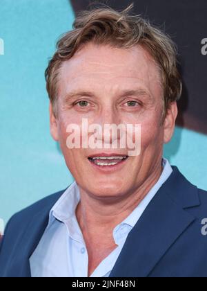 Los Angeles, United States. 10th Aug, 2022. LOS ANGELES, CALIFORNIA, USA - AUGUST 10: German actor Oliver Masucci arrives at the World Premiere Of Netflix's 'Day Shift' held at Regal Cinemas LA Live Stadium 14 on August 10, 2022 in Los Angeles, California, United States. (Photo by Xavier Collin/Image Press Agency) Credit: Image Press Agency/Alamy Live News Stock Photo