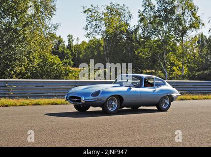 E Type Jaguar at speed Stock Photo