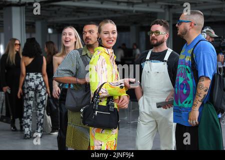 Copenhagen, Denmark - 10 Aug 2022, Copenhagen, Denmark. 10th Aug, 2022. Guests chatting after the Copenhagen Fashion Week SS 2023 Fashion event showcasing the Iso. Poetism brand in Scandinavia. Copenhagen Fashion Week is the main fashion event in Scandinavia. Copenhagen Fashion Week SS 2023 runs from 9 to 12 August 2022 this summer. Credit: SOPA Images Limited/Alamy Live News Stock Photo