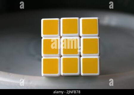Rubik's cube on the black background. Rubik's Cube invented by a Hungarian architect Erno Rubik in 1974. Stock Photo