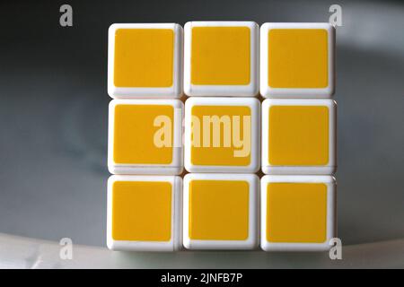 Rubik's cube on the black background. Rubik's Cube invented by a Hungarian architect Erno Rubik in 1974. Stock Photo