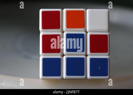 Rubik's cube on the black background. Rubik's Cube invented by a Hungarian architect Erno Rubik in 1974. Stock Photo