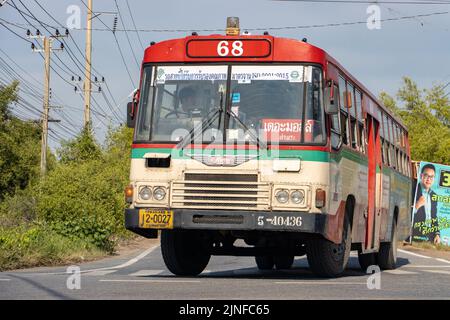 BANGKOK, THAILAND, APR 29 2022, A regular city bus runs on the road Stock Photo