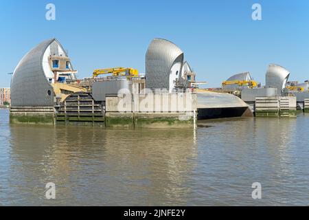 The Thames Barrier, London's flood defence system on a clear sunny day at high tide. Stock Photo