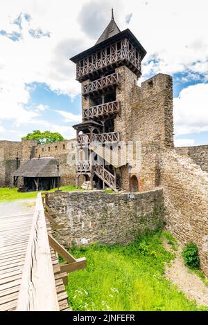 Medieval castle Helfstyn, Czech Republic. Ancient castle in gothic style. Castle walls and interiors, beautiful old tower. Summer weather, blue sky wi Stock Photo