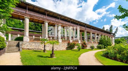 Lysice castle, Czech Republic. Famous baroque castle built in 14th century. Beautiful formal garden, palm trees and flowers. Promenade near the castle Stock Photo