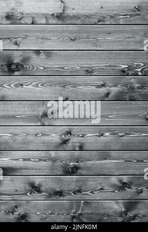 Abstract background, texture burnt wooden board.On black and white photo Stock Photo