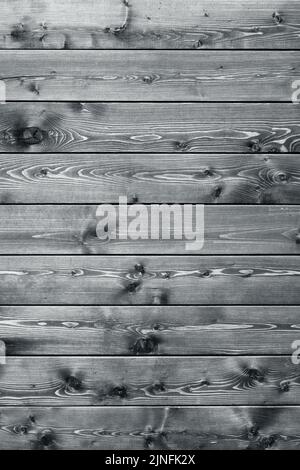 Abstract background, texture burnt wooden board.On black and white photo Stock Photo