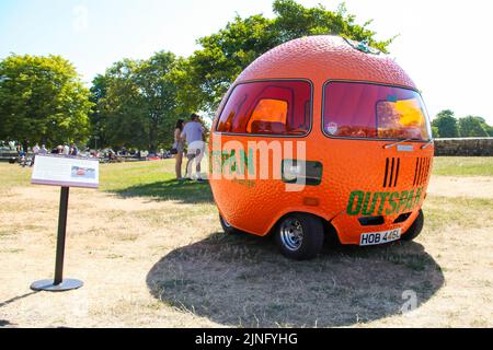 1972 Mini Outspan Orange promotional motor car, Beaulieu Supercar Weekend, Hampshire, England, UK, August 2022 Stock Photo