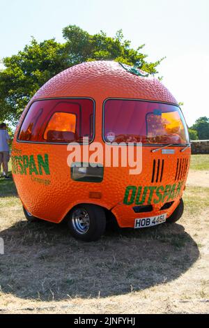 1972 Mini Outspan Orange promotional motor car, Beaulieu Supercar Weekend, Hampshire, England, UK, August 2022 Stock Photo