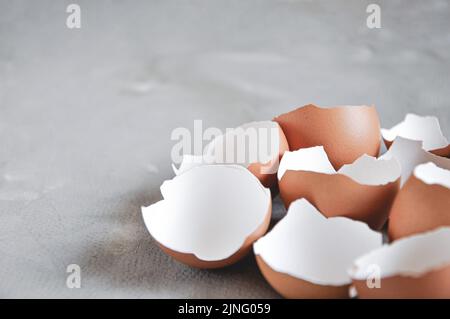 Eggshell. Shell of eggs on concrete kitchen table Stock Photo