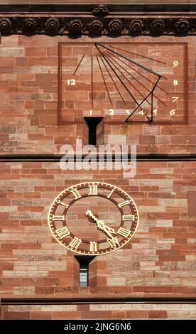 Church tower clock of the Basel cathedral with roman numerals Stock ...
