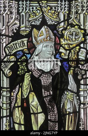 Stained glass window by Percy Bacon & Brothers depicting St Patrick, Mawgan-in-Pyder, Cornwall Stock Photo