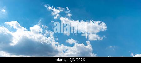 Panoramic of white clouds against blue sky, perfect background for website, banner and others Stock Photo