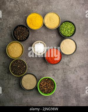 High quality photo of various spices with a dramatic concept on a dark background. Stock Photo