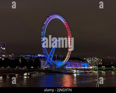 A London Eye ferris wheel in rainbow colors in support of London Pride, July 2nd 2022 Stock Photo