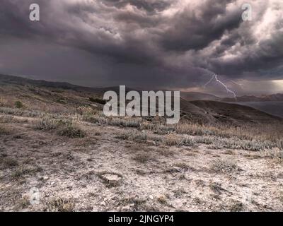 Lightning in a stormy sky. Psychedelic landscape. Thunderstorm with lightning strikes Stock Photo